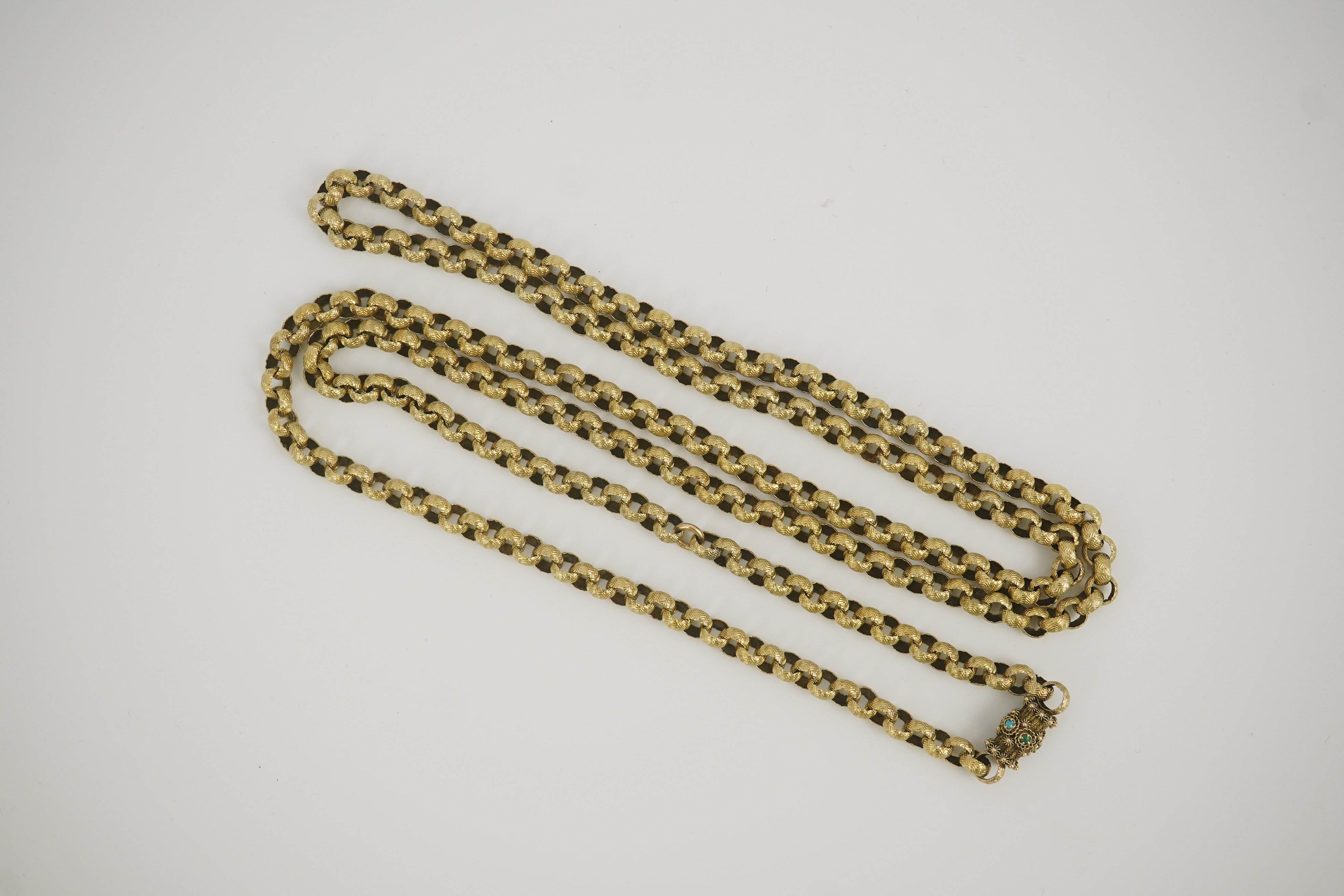 A Georgian gold textured circular link muff chain, with turquoise cluster set barrel shaped clasp